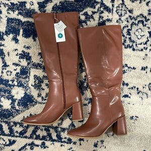 A new day tall boots with original tag